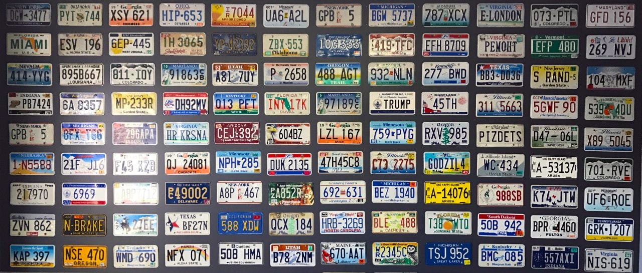 wall of license plates from various states